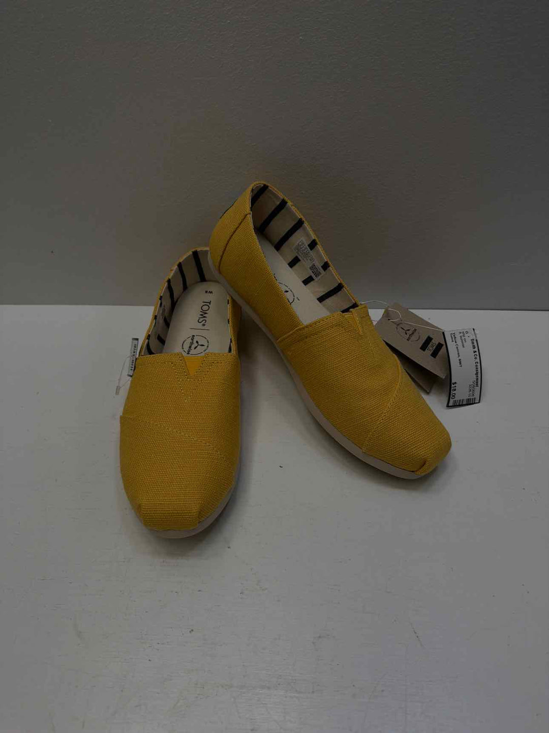 Toms 8 slip on